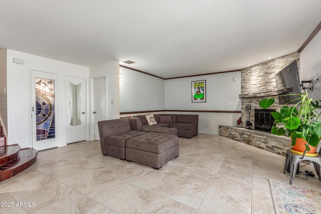 living room with a fireplace, crown molding, and light marble finish floors