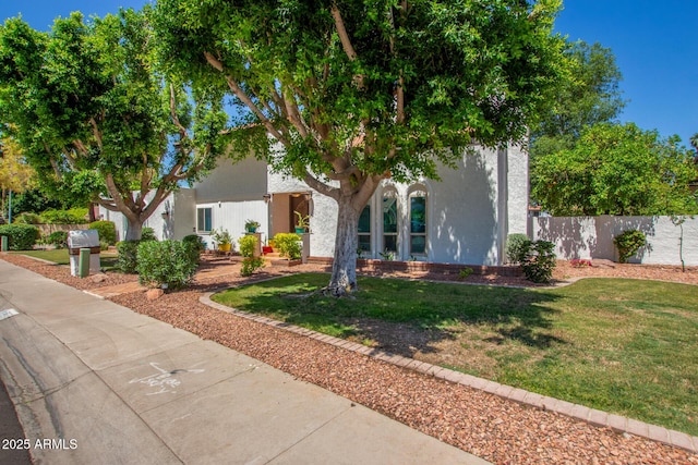 view of front of home with stucco siding
