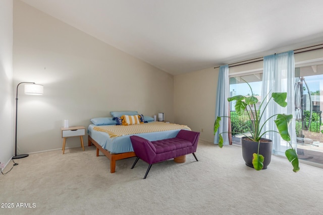bedroom with carpet flooring, vaulted ceiling, access to outside, and baseboards