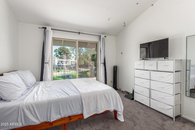 carpeted bedroom with vaulted ceiling