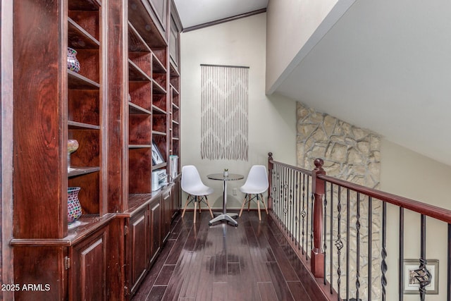 living area featuring dark wood-style floors and baseboards