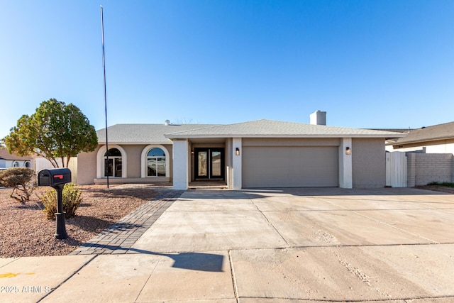 view of front of home with a garage