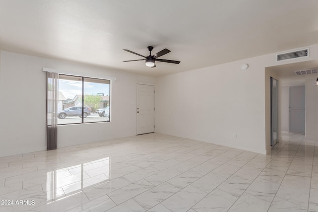 empty room featuring ceiling fan