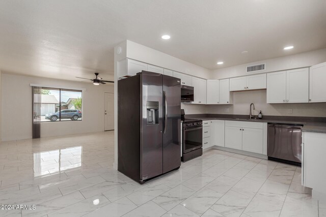 8508 W Clarendon Ave W, Phoenix, AZ 85037 - kitchen featuring dark countertops, dishwashing machine, electric range, stainless steel refrigerator with ice dispenser, and visible vents