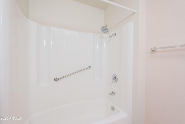 bathroom featuring washtub / shower combination