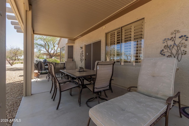 view of patio featuring outdoor dining space