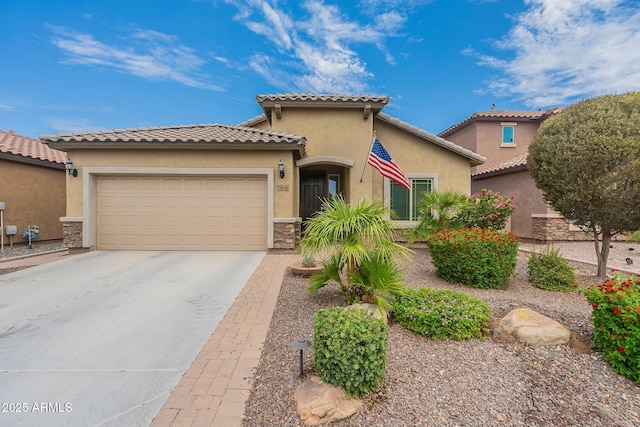 mediterranean / spanish-style home featuring a garage