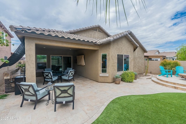 back of property featuring a patio