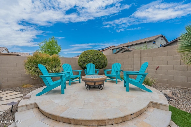 view of patio featuring a fire pit