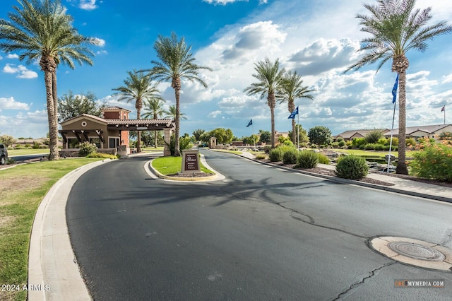 view of road featuring curbs