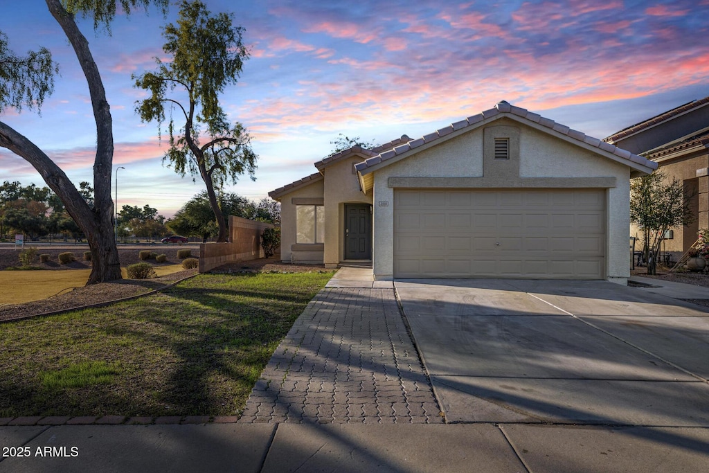 view of front of home featuring a garage