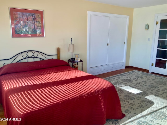 bedroom featuring hardwood / wood-style floors