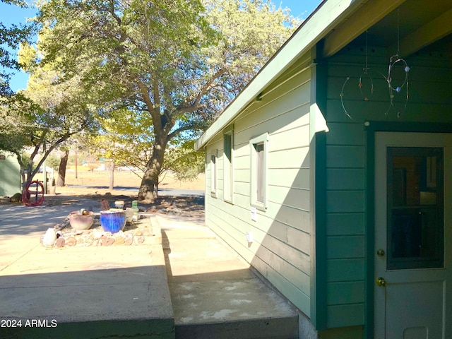 view of home's exterior with a patio area