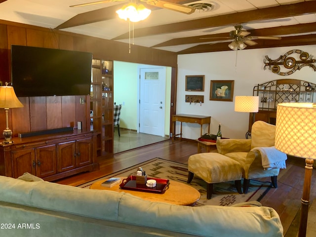 living room with lofted ceiling with beams, ceiling fan, and hardwood / wood-style floors