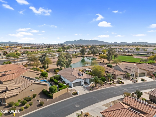 drone / aerial view with a residential view and a mountain view