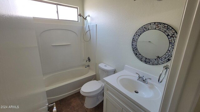 full bathroom with vanity, toilet, tile patterned floors, and tub / shower combination