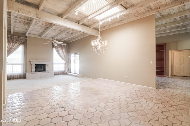 unfurnished living room featuring ceiling fan with notable chandelier, beam ceiling, and wooden ceiling