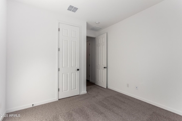 view of carpeted spare room