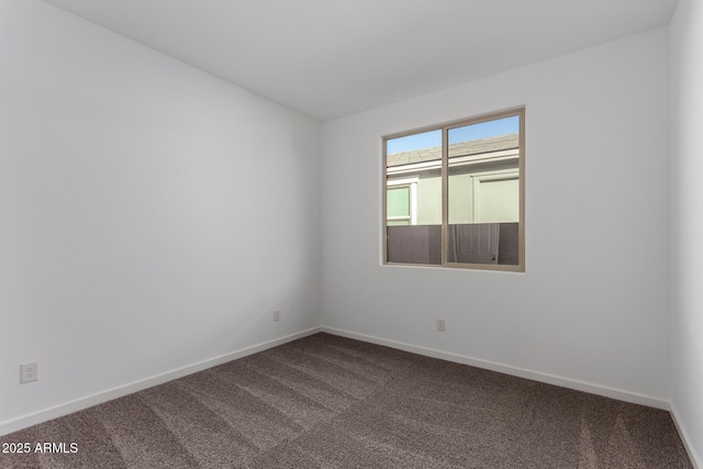 unfurnished room featuring carpet floors