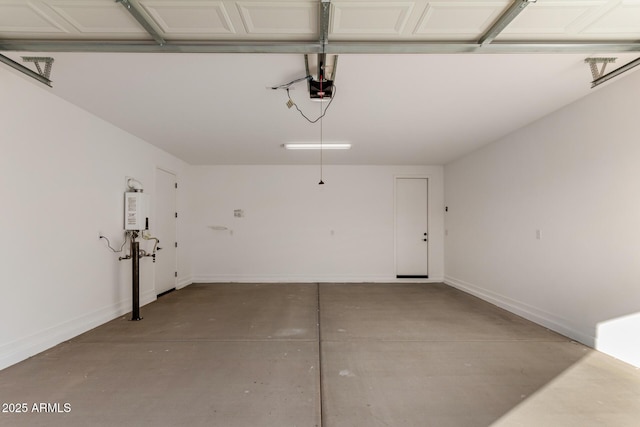 garage with a garage door opener and water heater