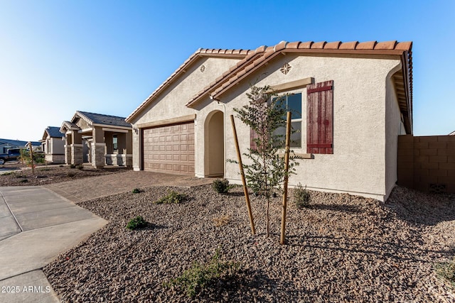 view of front of home with a garage