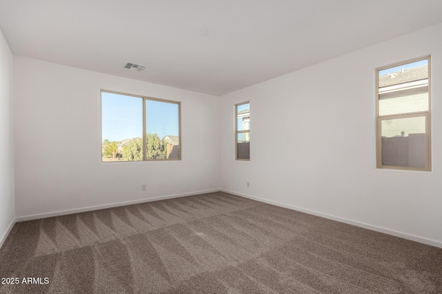 view of carpeted spare room