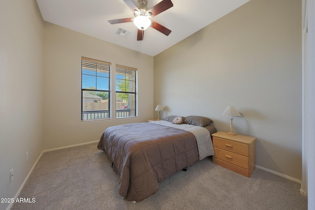 bedroom with light carpet and ceiling fan