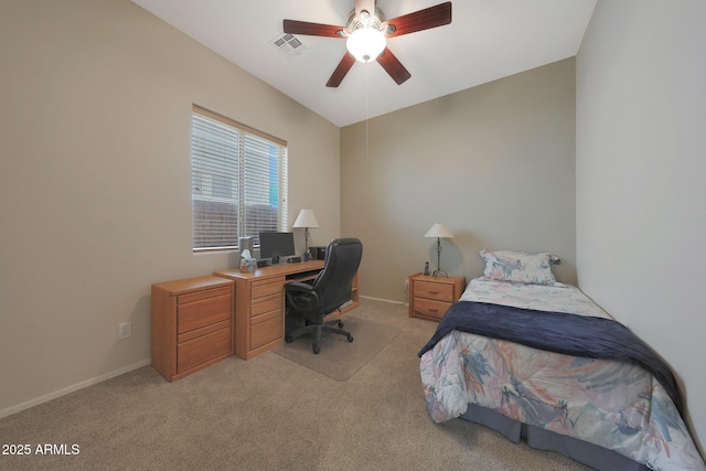 bedroom featuring light colored carpet and ceiling fan