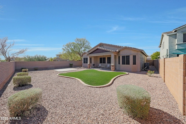 rear view of house featuring a patio