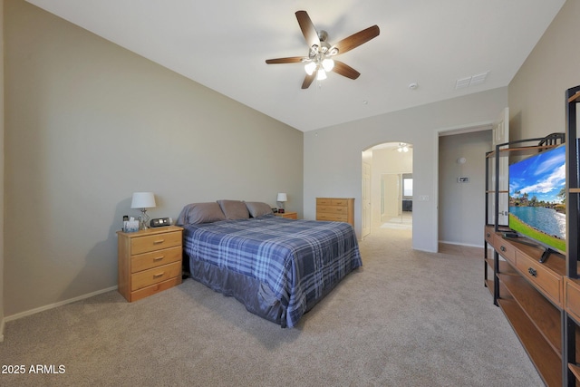 bedroom featuring ceiling fan and light carpet