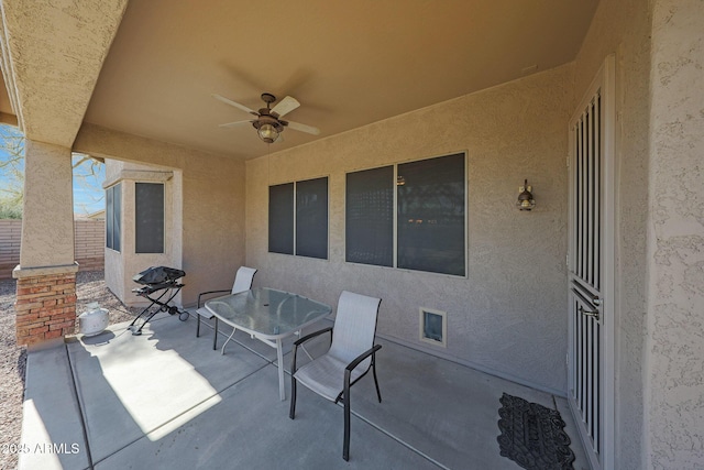 view of patio / terrace with ceiling fan