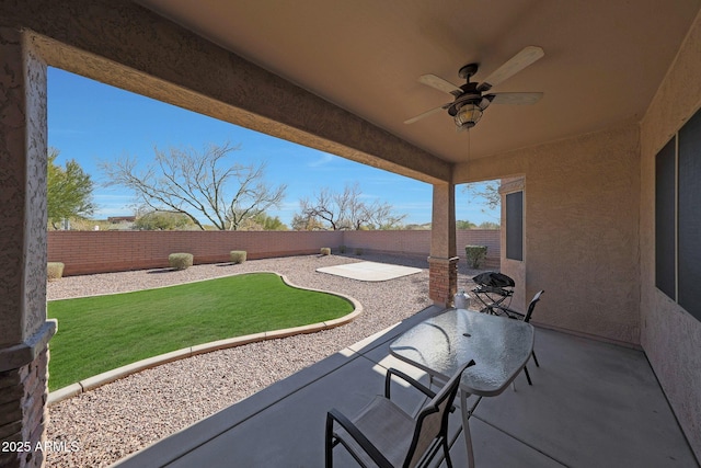 view of patio with ceiling fan