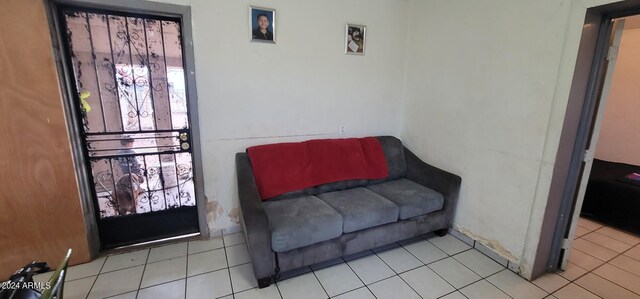 sitting room with light tile floors