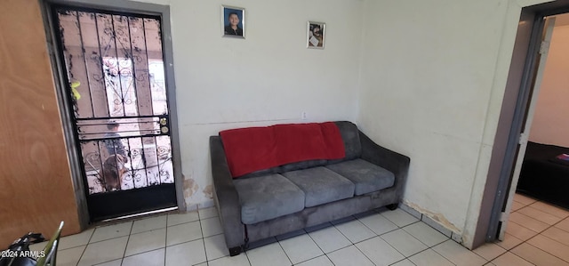 sitting room with light tile floors