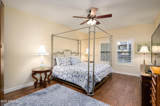 bedroom with dark wood-type flooring and ceiling fan