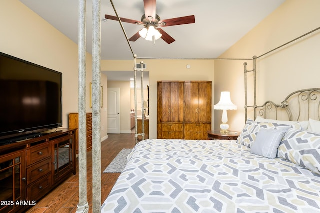 bedroom with ceiling fan and hardwood / wood-style flooring