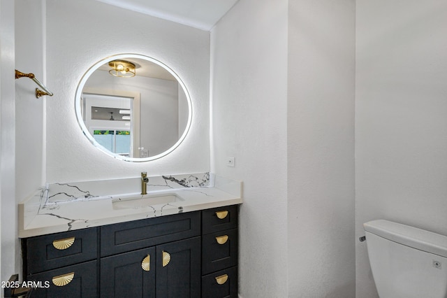 8913 S Forest Ave, Tempe, AZ 85284 - half bathroom with vanity and toilet