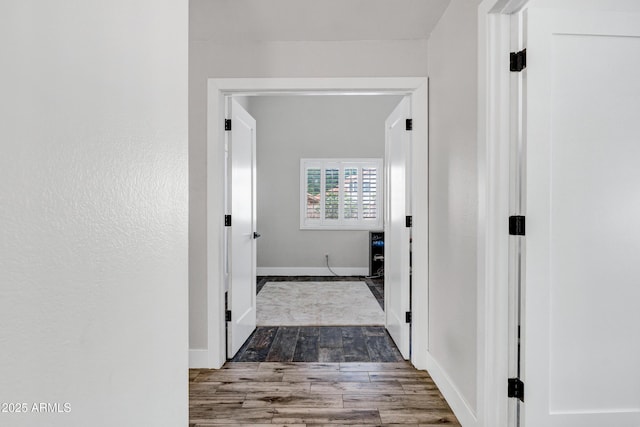 8913 S Forest Ave, Tempe, AZ 85284 - corridor featuring wood finished floors and baseboards