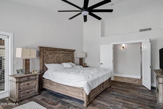 8913 S Forest Ave, Tempe, AZ 85284 - bedroom with high vaulted ceiling, a ceiling fan, baseboards, and dark wood finished floors