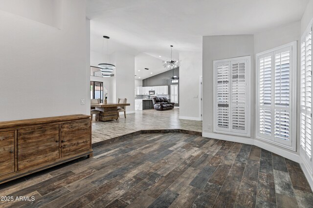 8913 S Forest Ave, Tempe, AZ 85284 - corridor with lofted ceiling, wood finished floors, and a chandelier