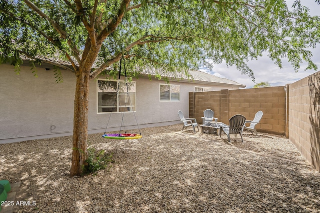 exterior space with a patio area and fence