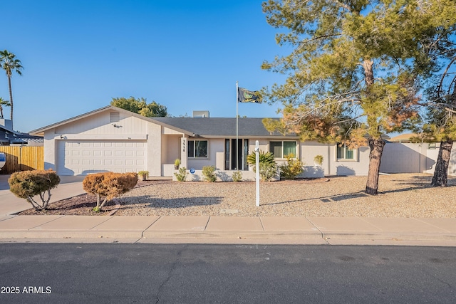 ranch-style home with a garage