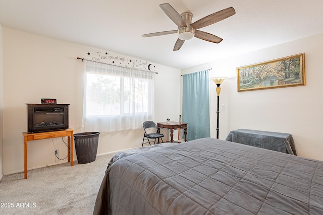 bedroom featuring ceiling fan and carpet flooring