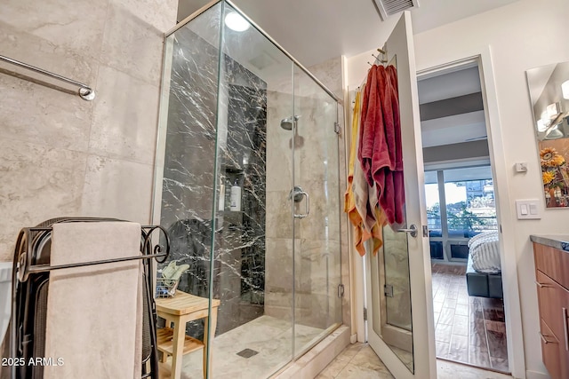 bathroom featuring vanity and walk in shower