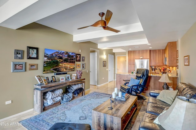 living room featuring light tile patterned floors and ceiling fan