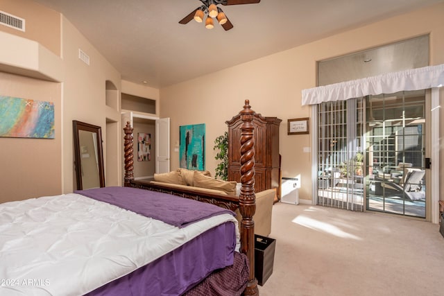 carpeted bedroom featuring ceiling fan and access to outside