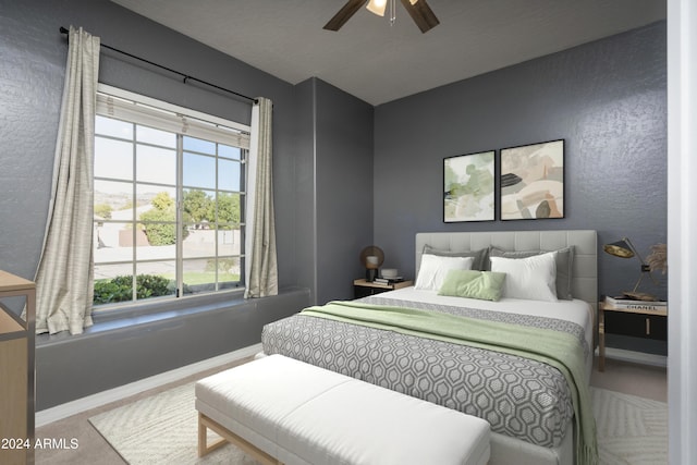 carpeted bedroom featuring ceiling fan