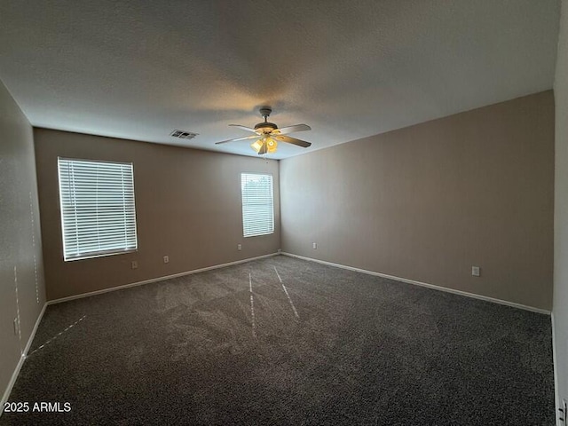 carpeted empty room with ceiling fan