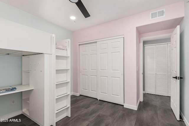 interior space featuring ceiling fan