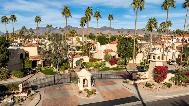 surrounding community featuring a mountain view